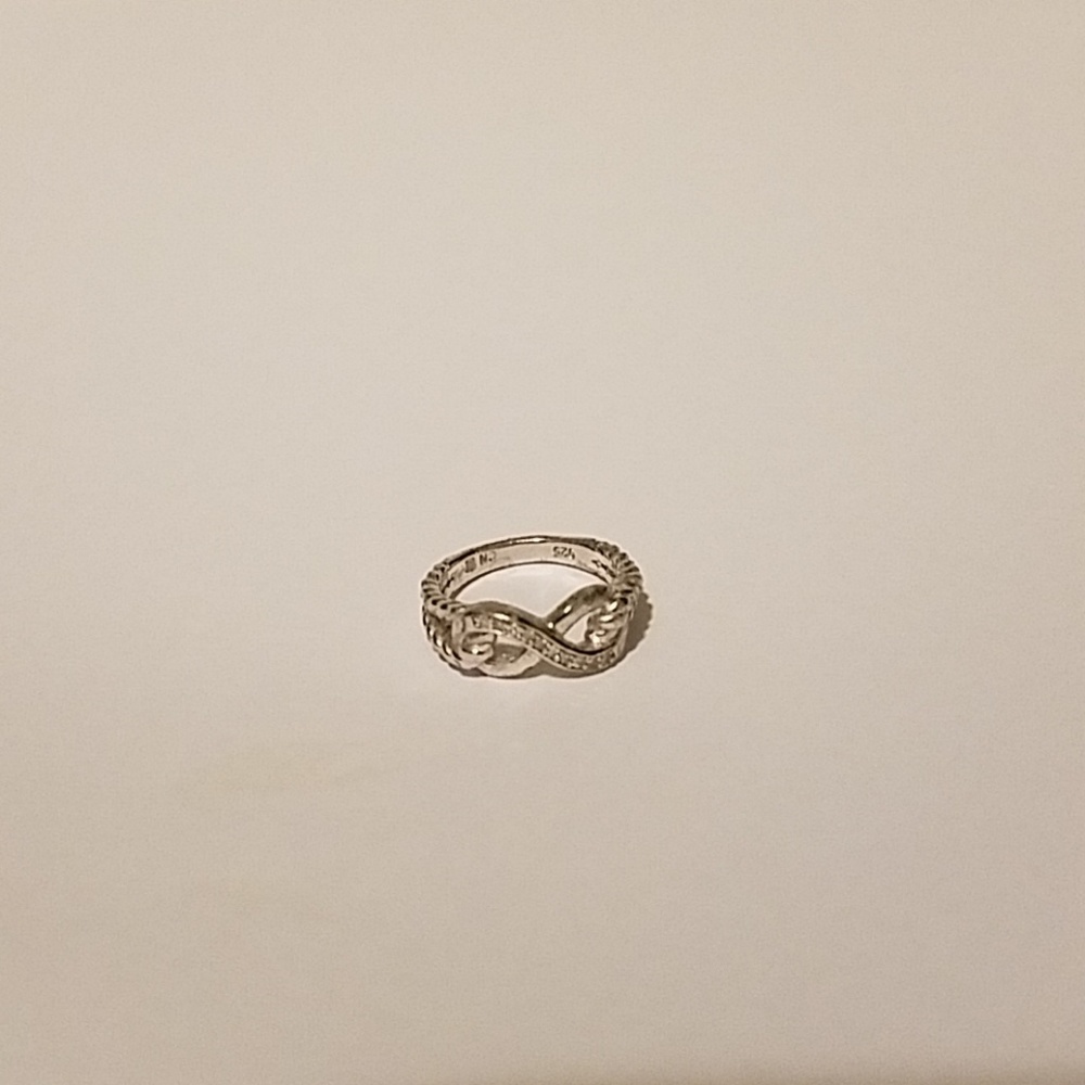 Delmar sterling silver diamond love knot 0.05 ctw
